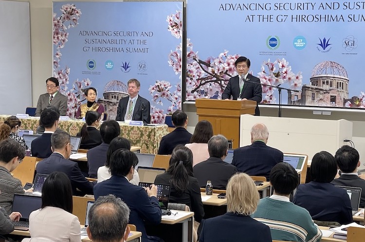 Photo: Soka University President Masashi Suzuki making the welcoming speech at a one-day international conference titled ‘Advancing Security and Sustainability at the G7 Hiroshima Summit’ held at the University on March 29, 2023. (From left to right): Hirotsugu Terasaki, Director General, Peace and Global Issues, Soka Gakkai International (SGI), Audrey Kitagawa, President, International Academy of Multicultural Cooperation (IAMC), and John Kirton, Director, G7 Research Group. Credit: Katsuhiro Asagiri, Multimedia Director of IDN-INPS.