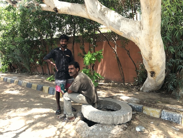 Adil Masih and Amjad Masih work in the sewers of Karachi, a dangerous and low-paying occupation. Credit: Zofeen T. Ebrahim/IPS