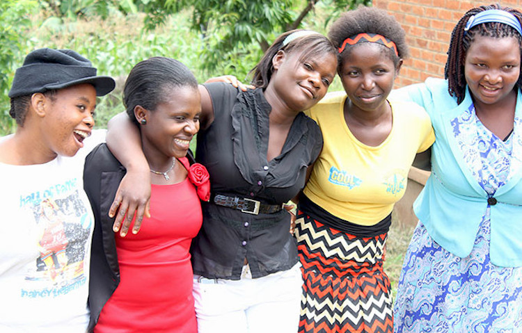 Photo: Girls from the Safeguard Young People programme in Malawi, which provides sexual and reproductive health information, helps young people access health services, and offers leadership training. Credit: UNFPA Malawi/Hope Ngwira.