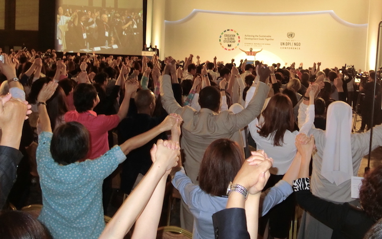 Photo: Participants applauding adoption of the Global Education Action Plan by the UN Department of Public Information/Non-Governmental Organization Conference, Gyeongju. Credit: Katsuhiro Asagiri | INPS Japan