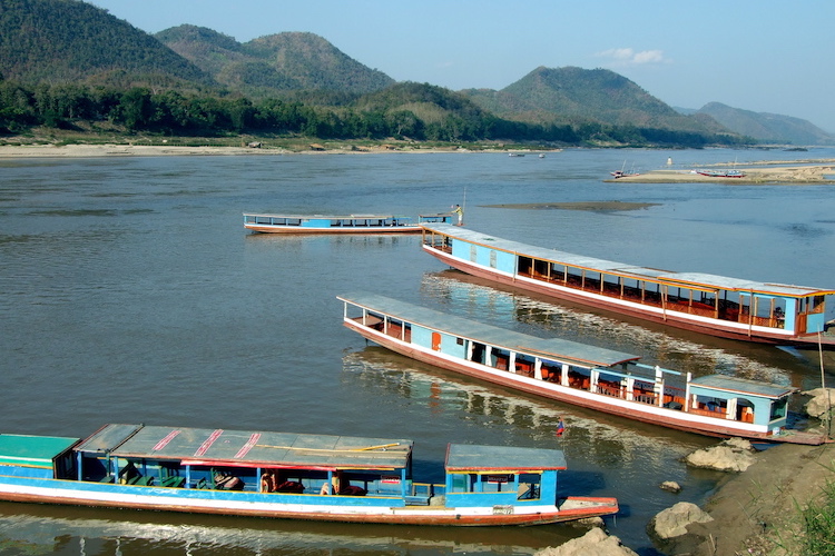 Photo: Mekong River flowing through Luang Prabang in Laos showing the lower water levels of the once mighty river, at low tide. Credit: Kalinga Seneviratne