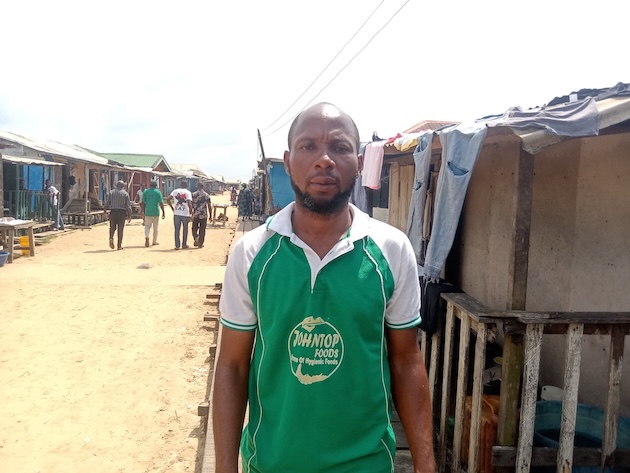 Emmanuel Aralu lost his business to the raging waters and now struggles to feed his family. Credit: Promise Eze/IPS