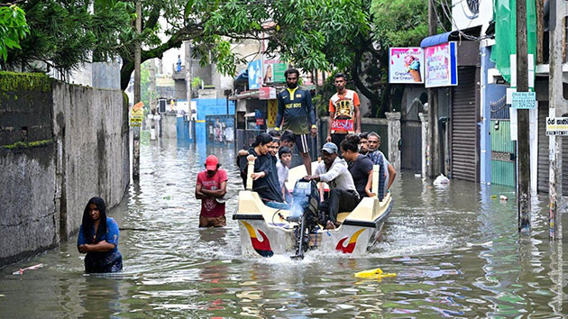 Residents travel by boat through flooded streets in Colombo after heavy rains from Cyclonic Storm Ditwah. Credit: UNICEF, Sri Lanka
