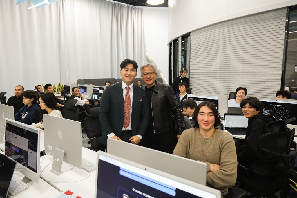 NVIDIA CEO Jensen Huang meets young learners at the alem.ai International AI Center in Astana, Kazakhstan, on October 23, 2026. | Photo: Astana Hub.